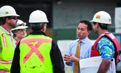 David Chiu, running for the State Assembly, consults with members of the building trades.